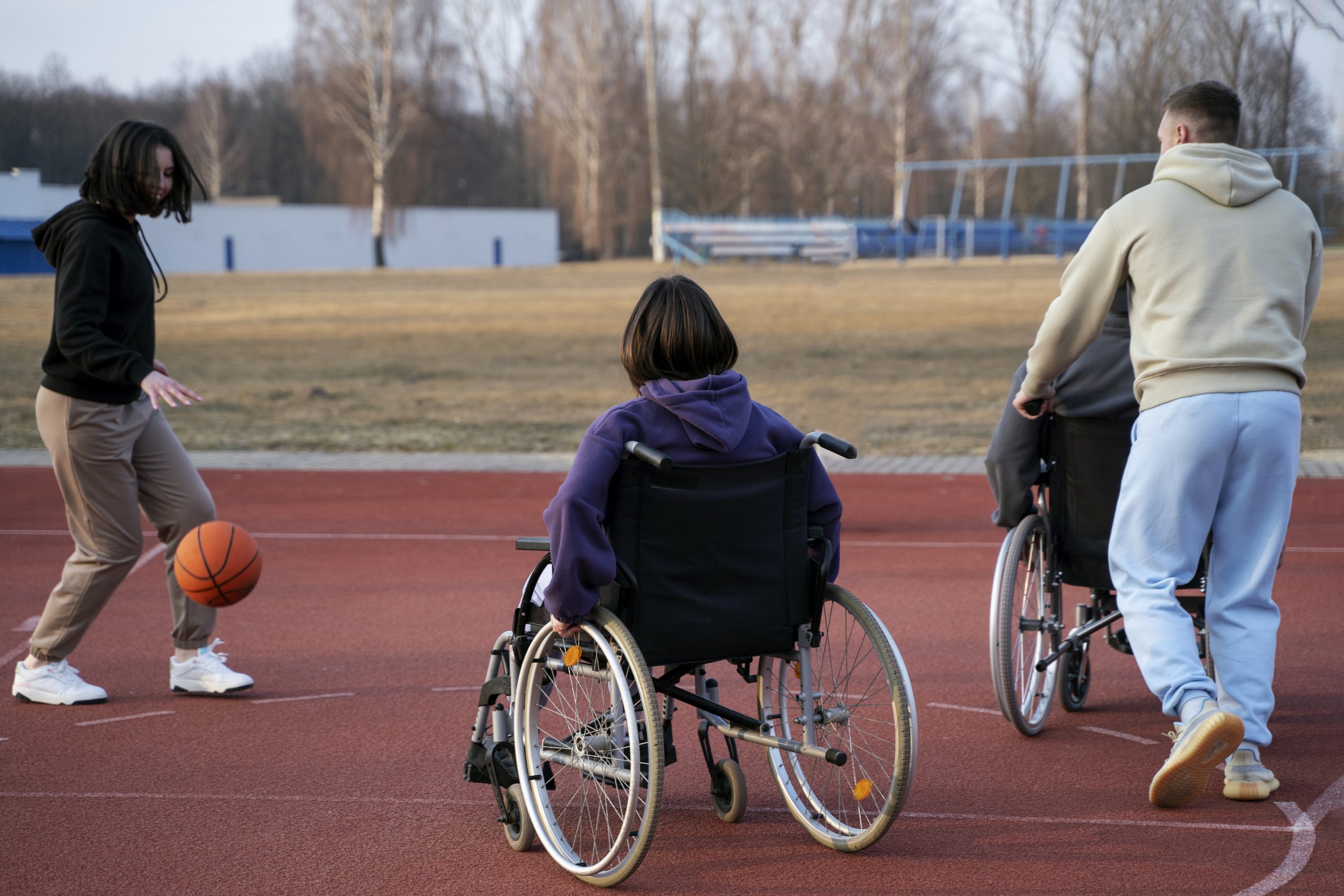 full-shot-friends-playing-basketball-together