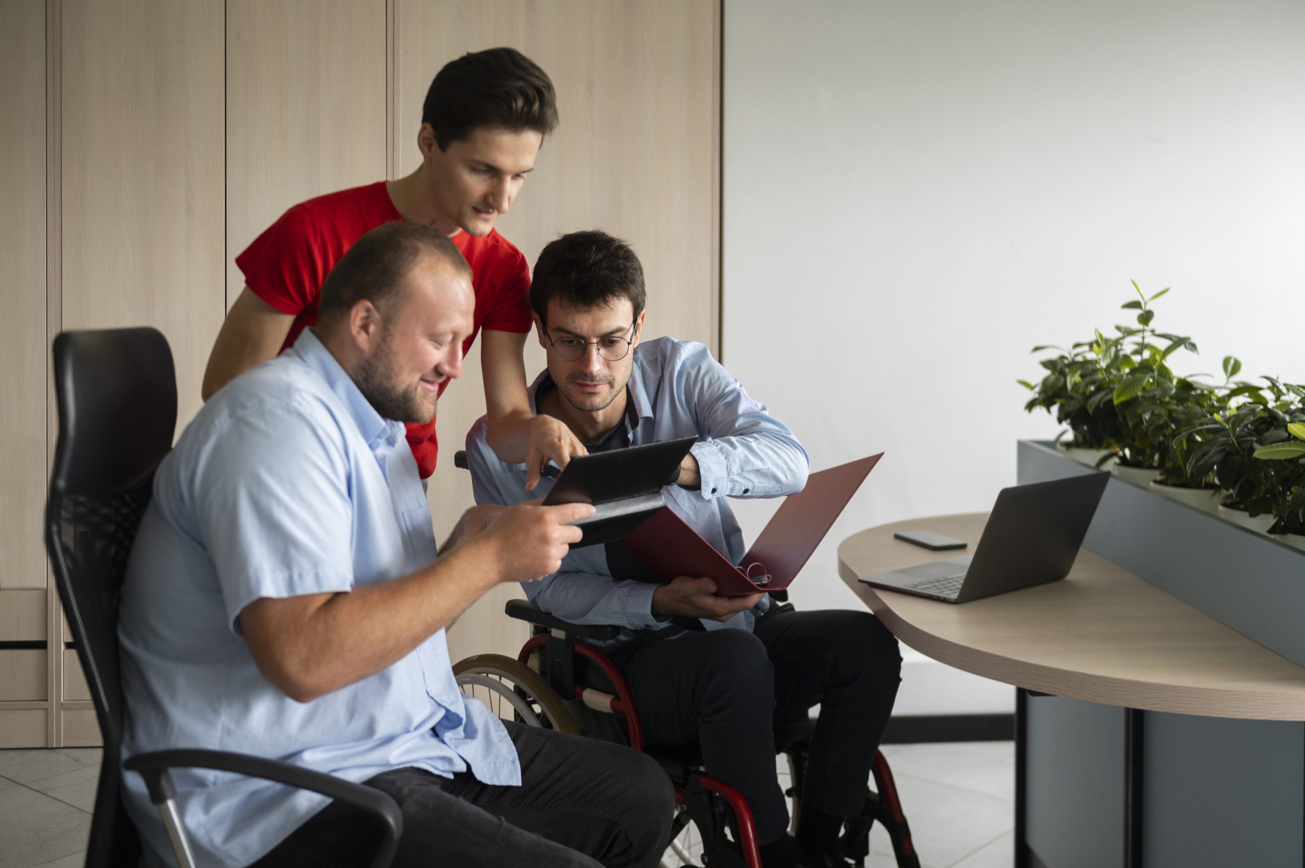 man-wheelchair-working-front-view